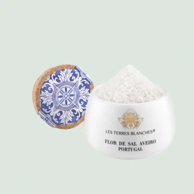 Close-up of bright white fleur de sel crystals with violet tint