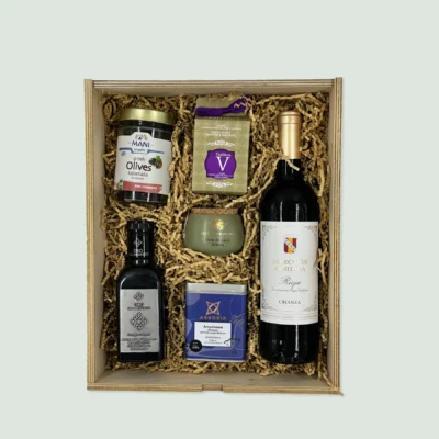 Luxury Gift 101: Mediterranean Experience a box filled with wine honey olives sea salt herbs andd olive oil from mediterranean countries