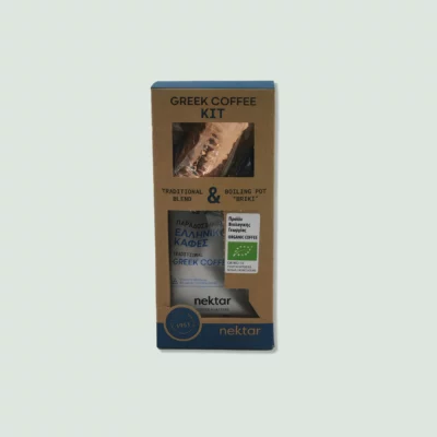 A Nektar Greek Coffee Kit containing a package of traditional Greek coffee and a copper cezve (briki). The kit is packaged in a cardboard box with windows showing the contents.
