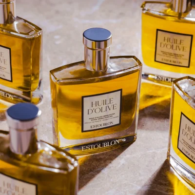 Premium olive oil bottle styled on modern dining table