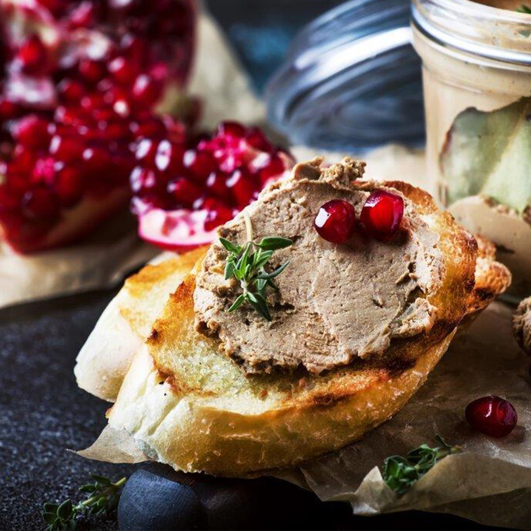 A beautifully presented plate of Royal Pate Foie Gras paired with toasted bread, perfect for a refined appetizer or celebration.