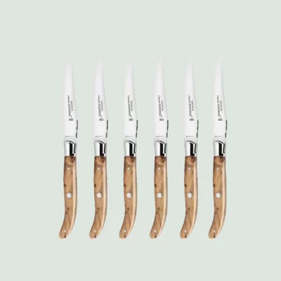 Polished Laguiole steak knife with juniper wood handle and stainless steel bolster