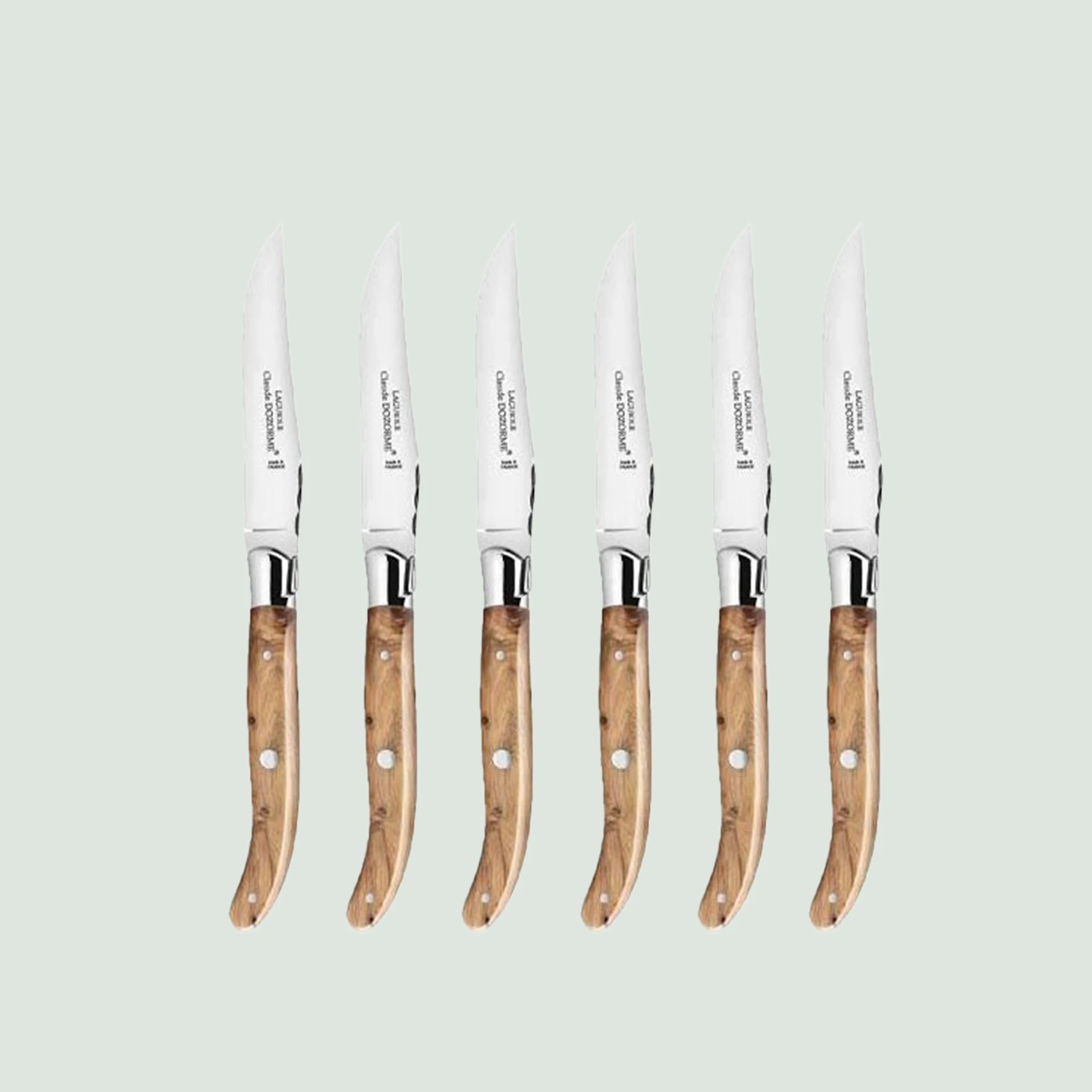 Polished Laguiole steak knife with juniper wood handle and stainless steel bolster