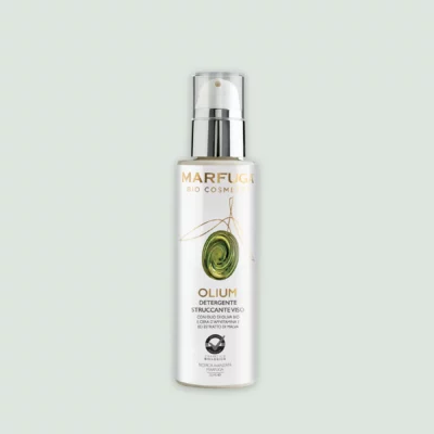 Close-up of the Olium Make-Up Remover bottle with organic EVOO, beeswax, vitamin E, and mauve extract.