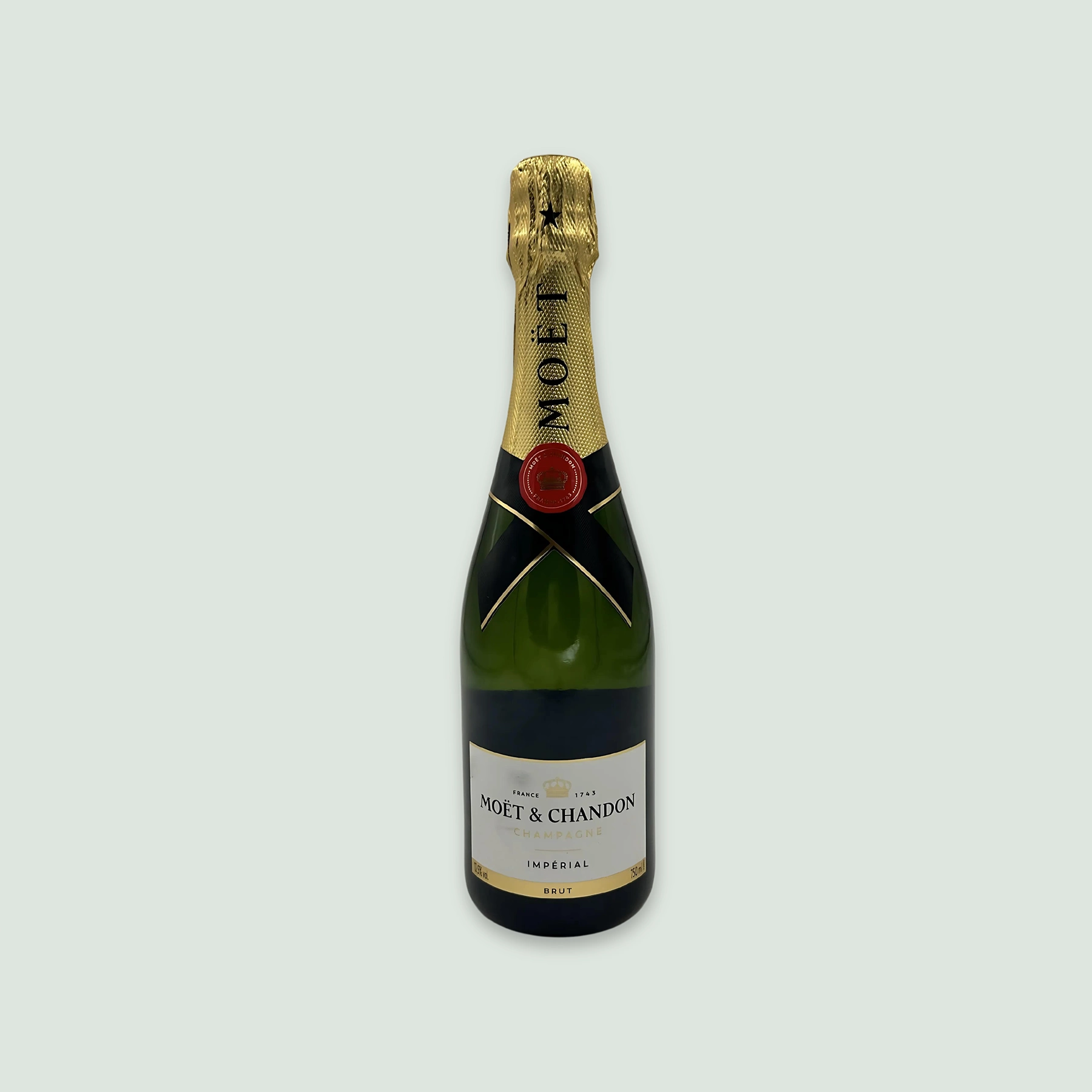 Front view of Moët Impérial Champagne bottle with golden label.