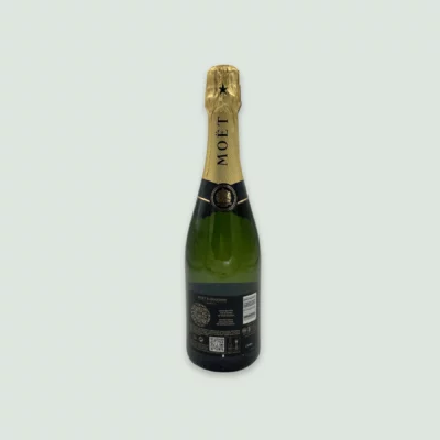 Back view of Moët Impérial Champagne bottle showing details of the label.