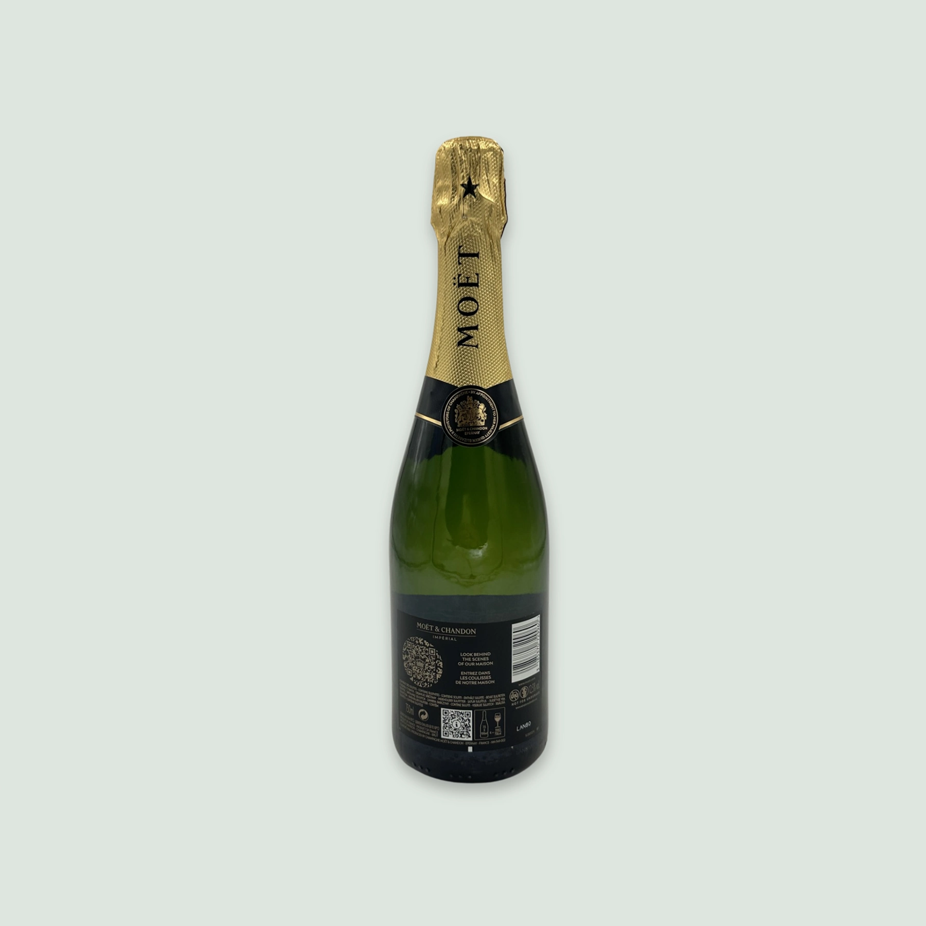 Back view of Moët Impérial Champagne bottle showing details of the label.