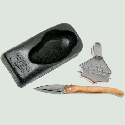 Close-up of Laguiole oyster knife with olive wood handle and matte stainless steel bolsters