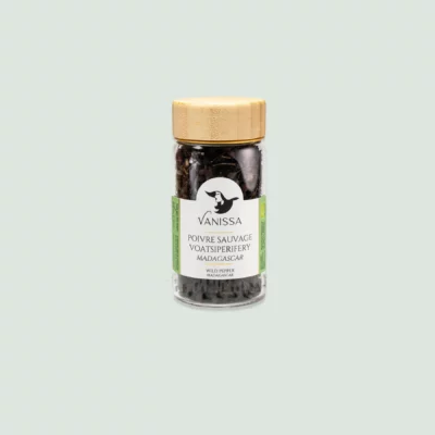 Close-up of Black Pepper Madagascar, featuring Voatsiperifery Wild Black Peppercorns in a 60g glass jar, showcasing their dark and aromatic peppercorns.