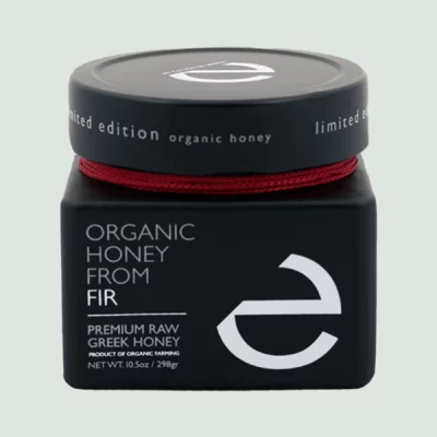 Close-up of the front label of Eulogia’s Premium Organic Fir Honey, showcasing the luxurious 250g jar with elegant branding and details.