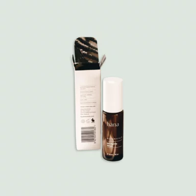 Close-up of Pro-Aging Serum bottle next to its packaging, highlighting the label and design.