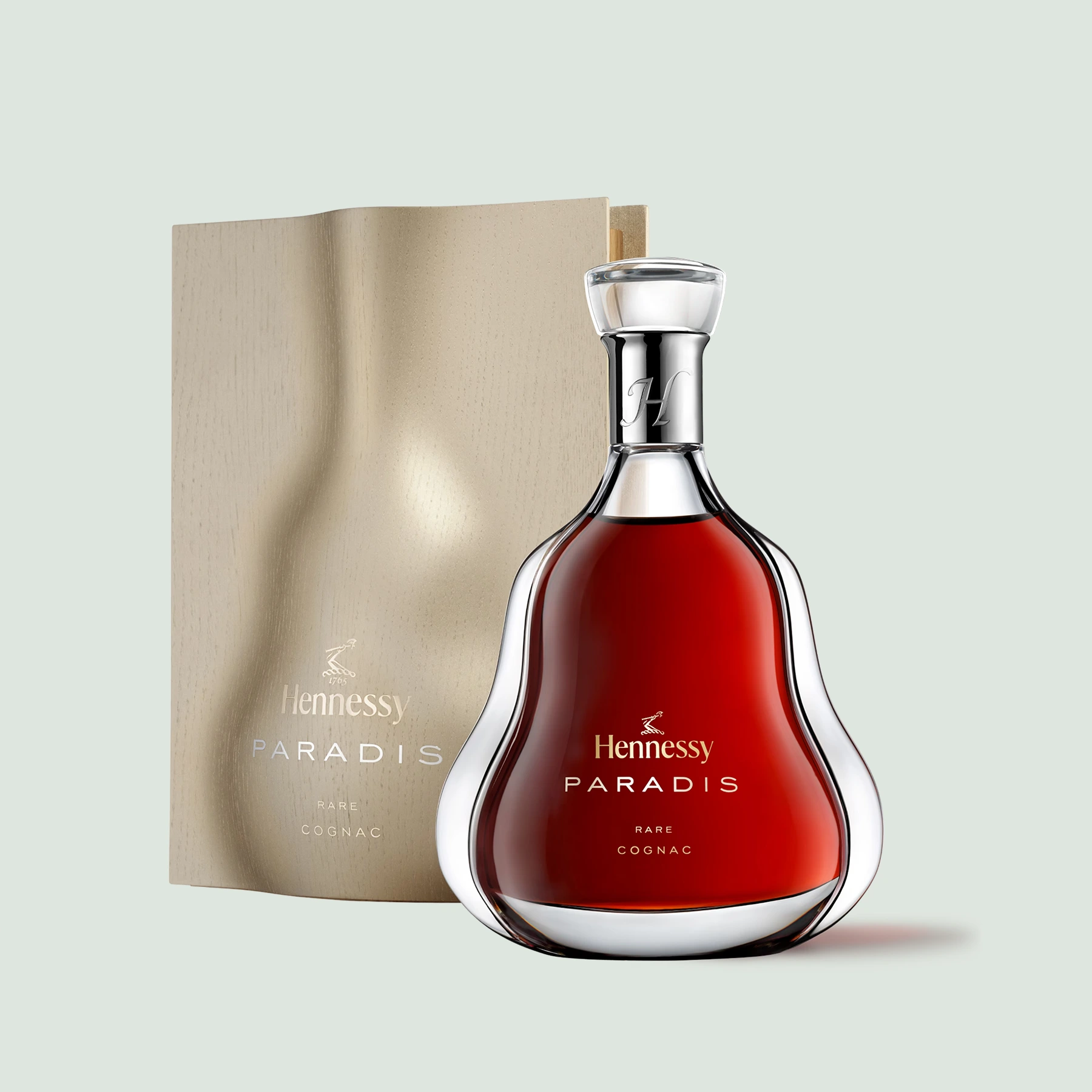 Hennessy Paradis Rare Cognac bottle displayed with its luxurious packaging, highlighting the brand's commitment to craftsmanship.