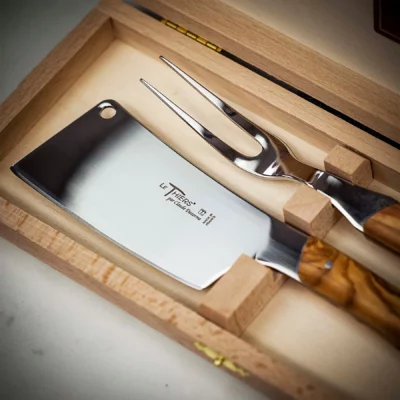 Open view of beech wood box containing Le Thiers cheese service set