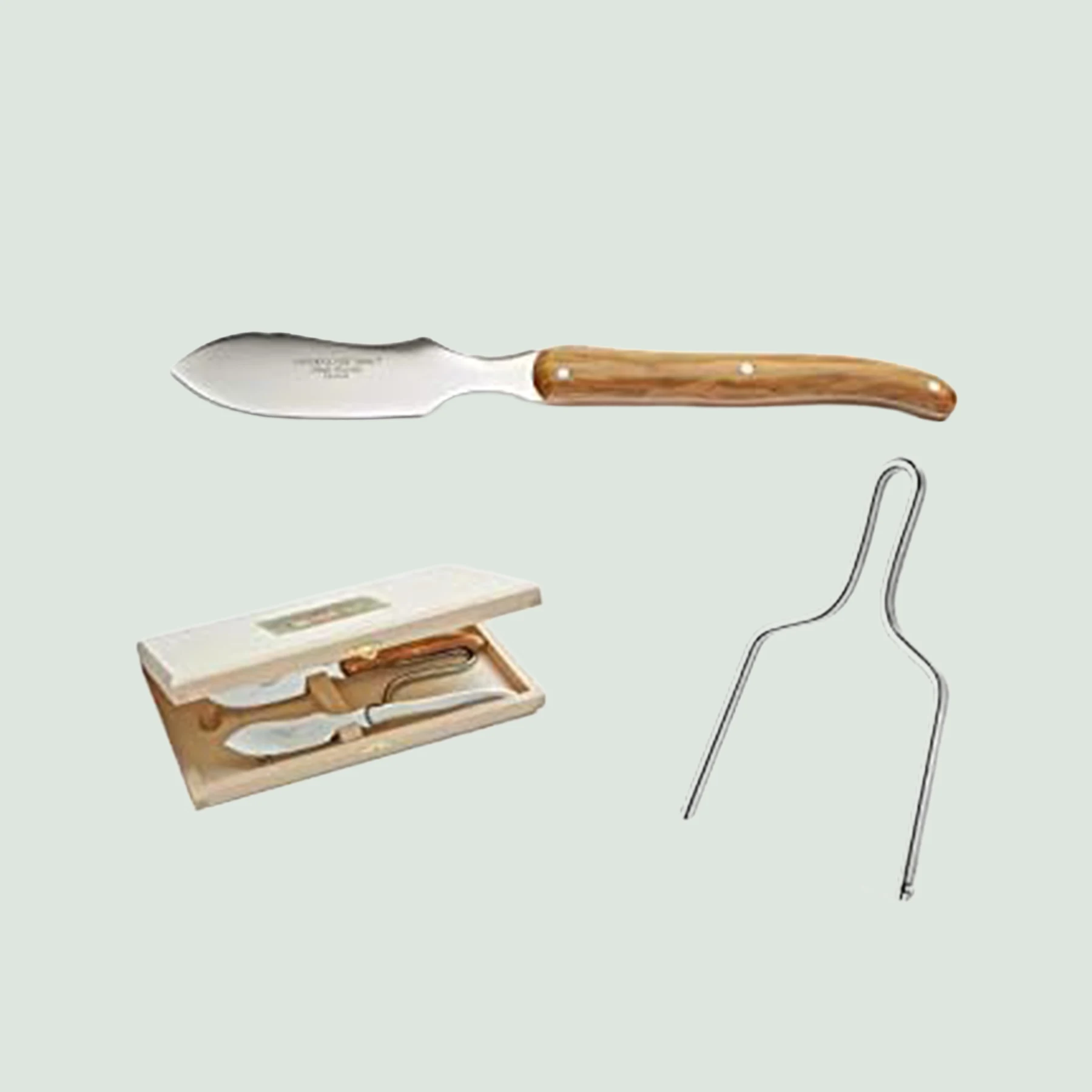 Foie gras lyra knife with olive wood handle and stainless steel bolster, close-up