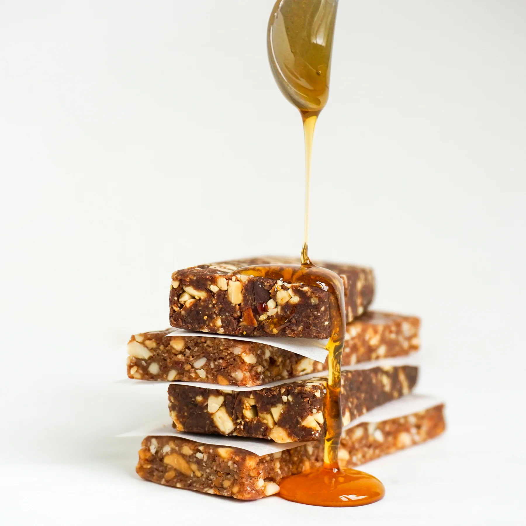 Clean ingredient energy bar with organic honey, strawberries, and blueberries