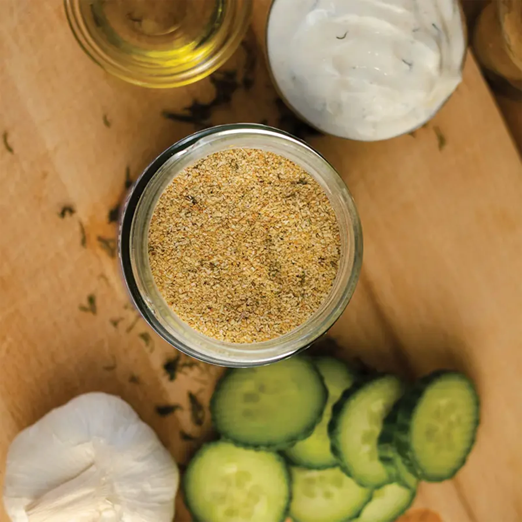 Close-up of traditional Greek yogurt dip sprinkled with fresh dill